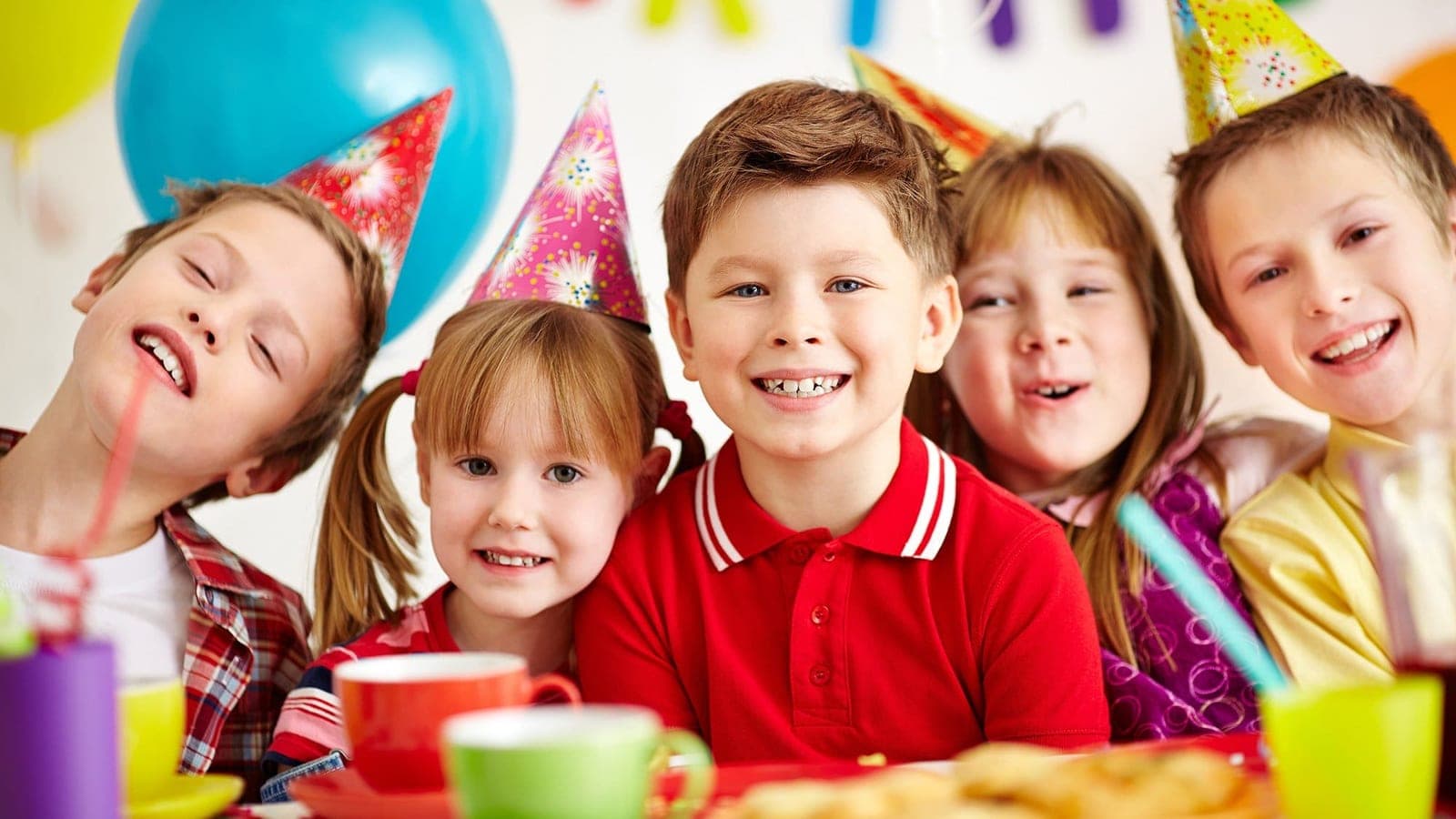 LUXBOOTH photobooth setup at a kids' birthday with costumes
