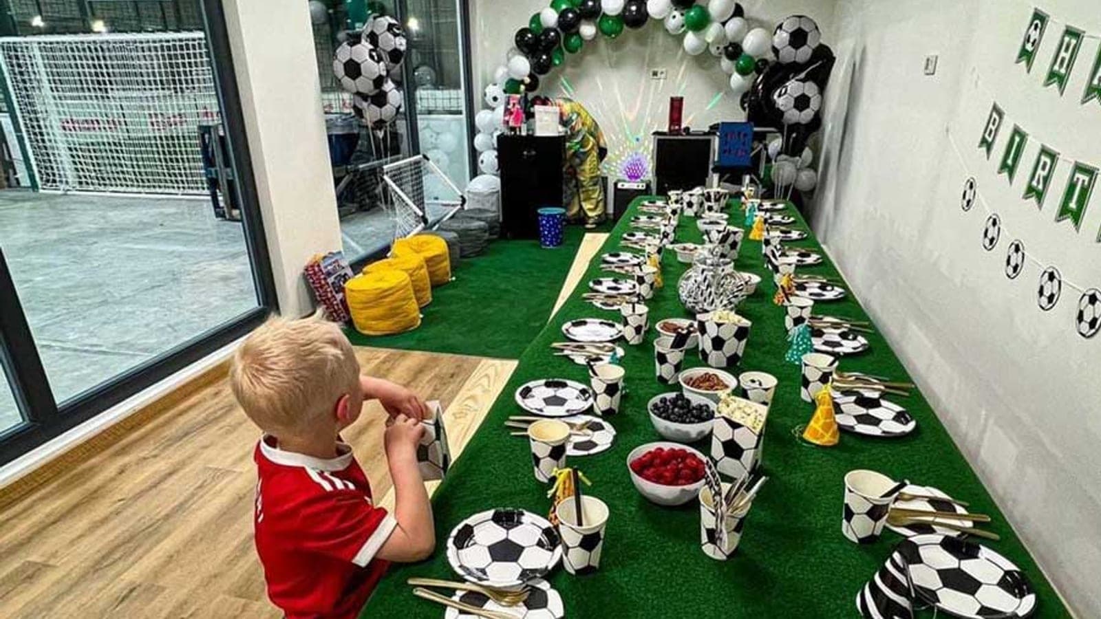 Birthday-party setup at Sport4Lux Munsbach — themed table, balloons and cake