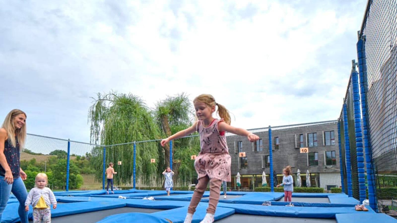 Outdoor trampoline park at Auberge de Jeunesse Echternach (Lake of Echternach)